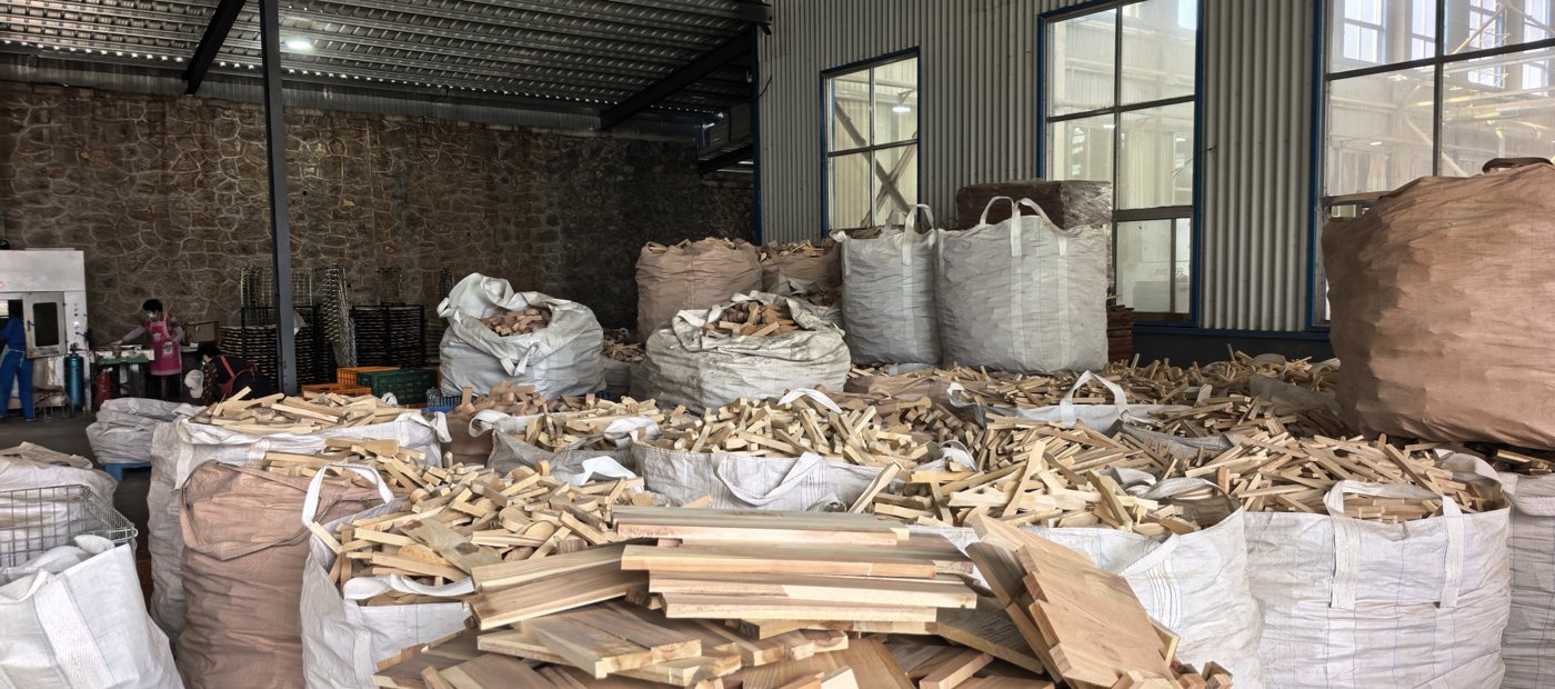 Kitchenware blanks collected in bulk while waiting for downstream processing.